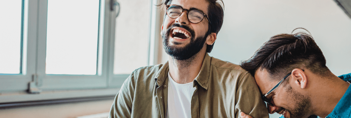 1200x406_male couple laughing male couple laughing