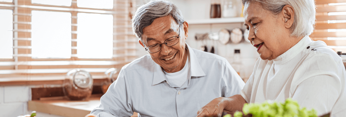 1200x406_older couple preparing a meal at home older couple preparing a meal at home